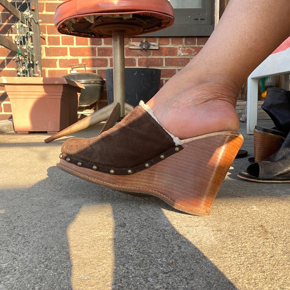 Brown shearling lined suede-ish wedge mule.